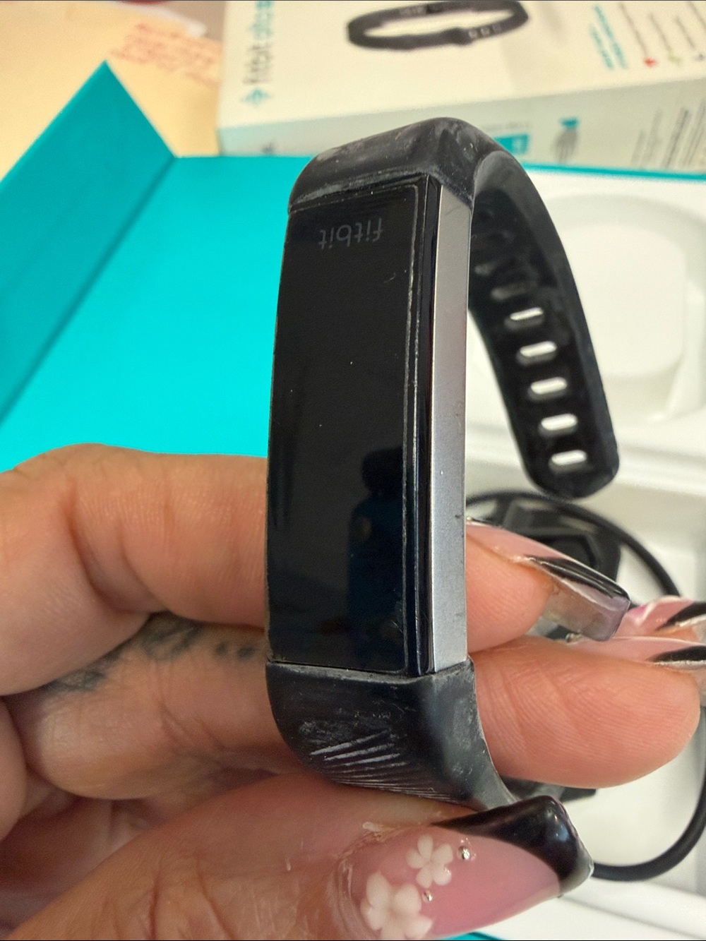 fitbit Black and Silver Activity Tracker